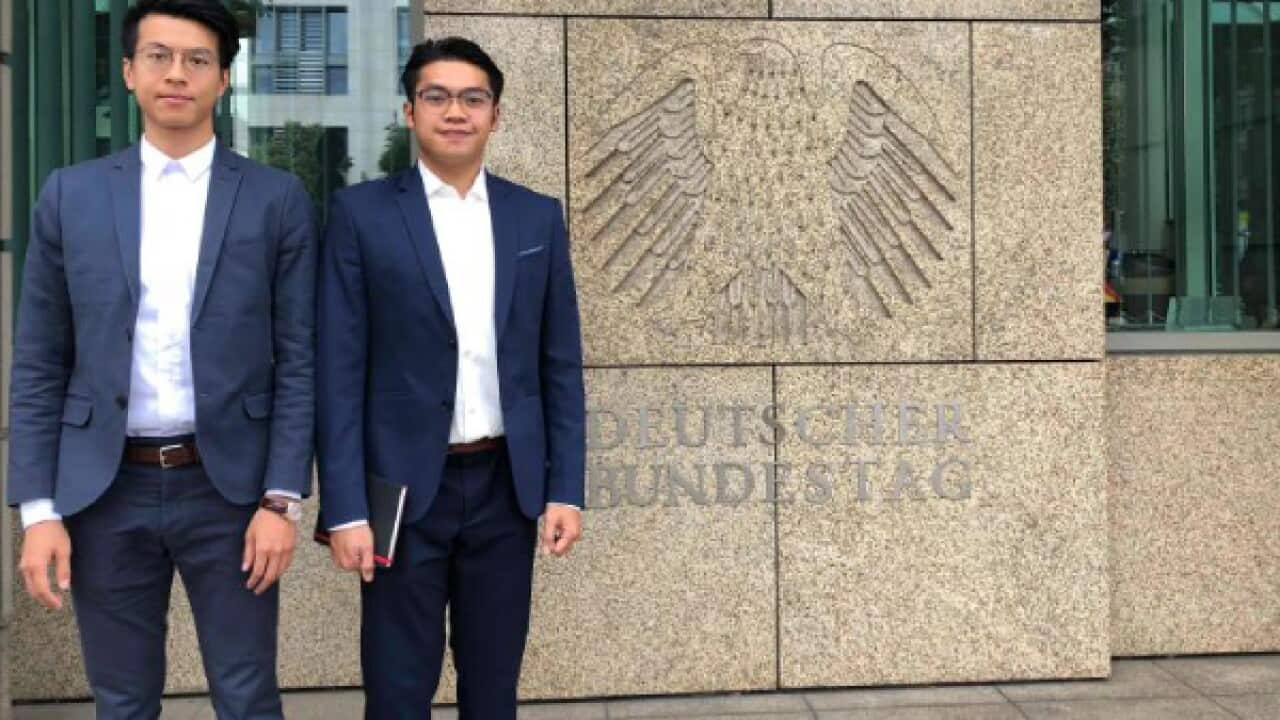 Germany has granted refugee status to Ray Wong and Alan Li, two Hong Kong democracy activists who were facing rioting charges in Hong Kong.