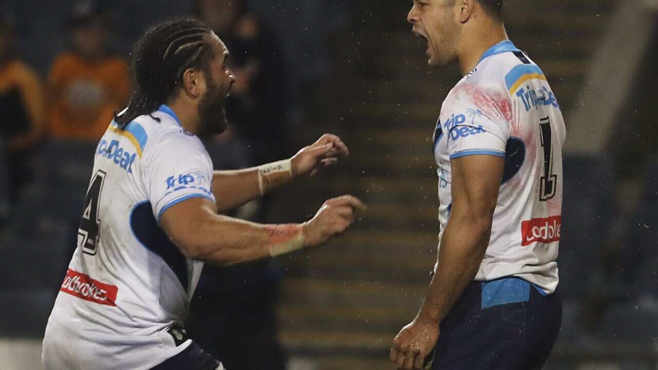 Jarryd Hayne(right) celebrates with teammate Konrad Hurrell
