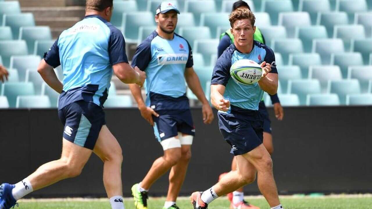 Michael Hooper (right) in action during a training session.