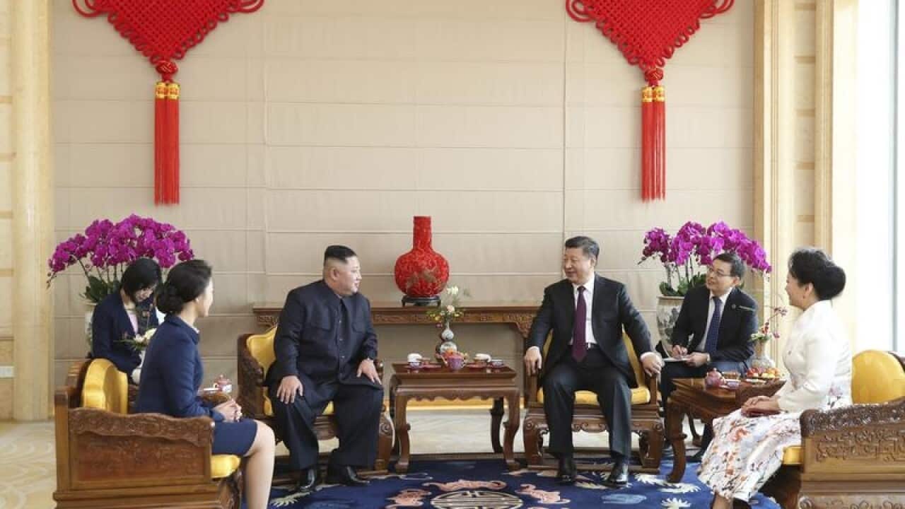 Kim Jong-un (3rd left) with Chinese President Xi Jinping (3rd right).
