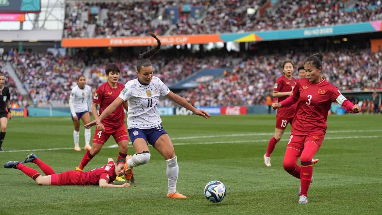 Sophia Smith (USA) controls the ball between Vietnam players at the FIFA Women's World Cup Australia & New Zealand 2023 game