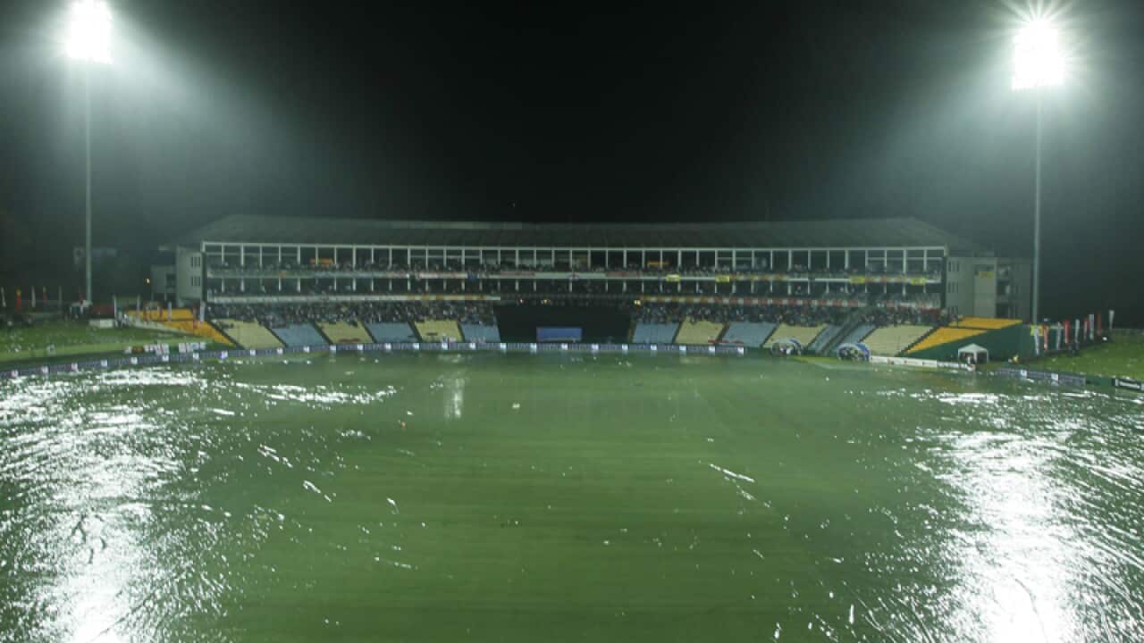 The cricket ground is seen covered in plastic sheets in Pallekele