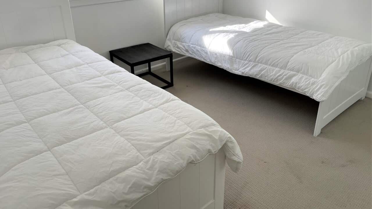 Beds in a women's shelter (SBS-Sandra Fulloon).jpg