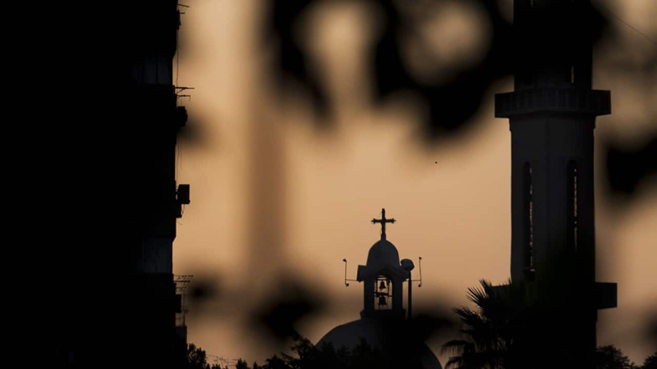 A church are silhouetted during sundown in Cairo, Egypt.