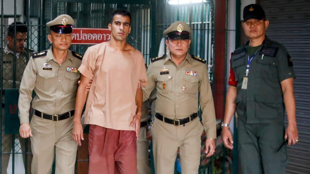 Hakeem Al-Araibi escorted by Thai prison officers following extradition hearing in Bangkok