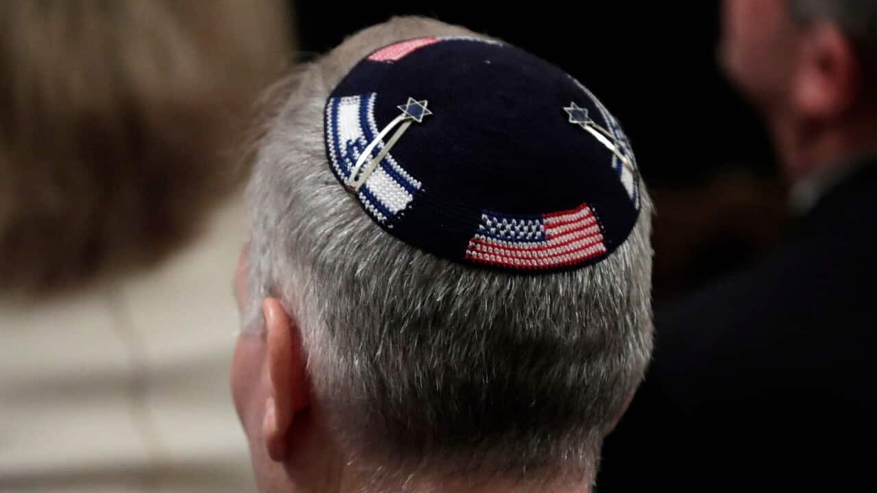 A guest wears a special kippah at joint remarks by US President Donald Trump and Israel Prime Minister Benjamin Netanyahu