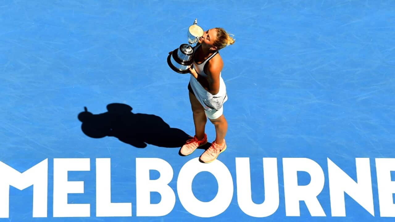 Marta Kostyuk of Ukraine celebrates her win against Rebeka Masarova