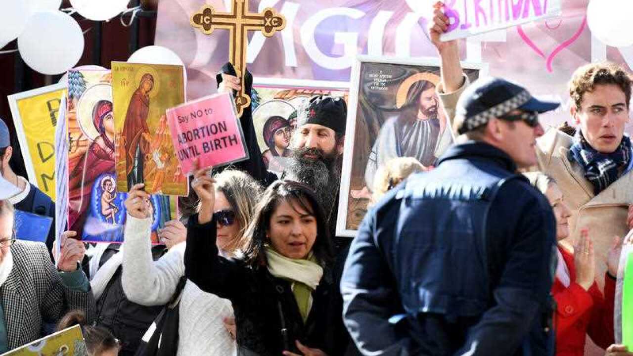 Anti-abortion protesters gather outside NSW Parliament.