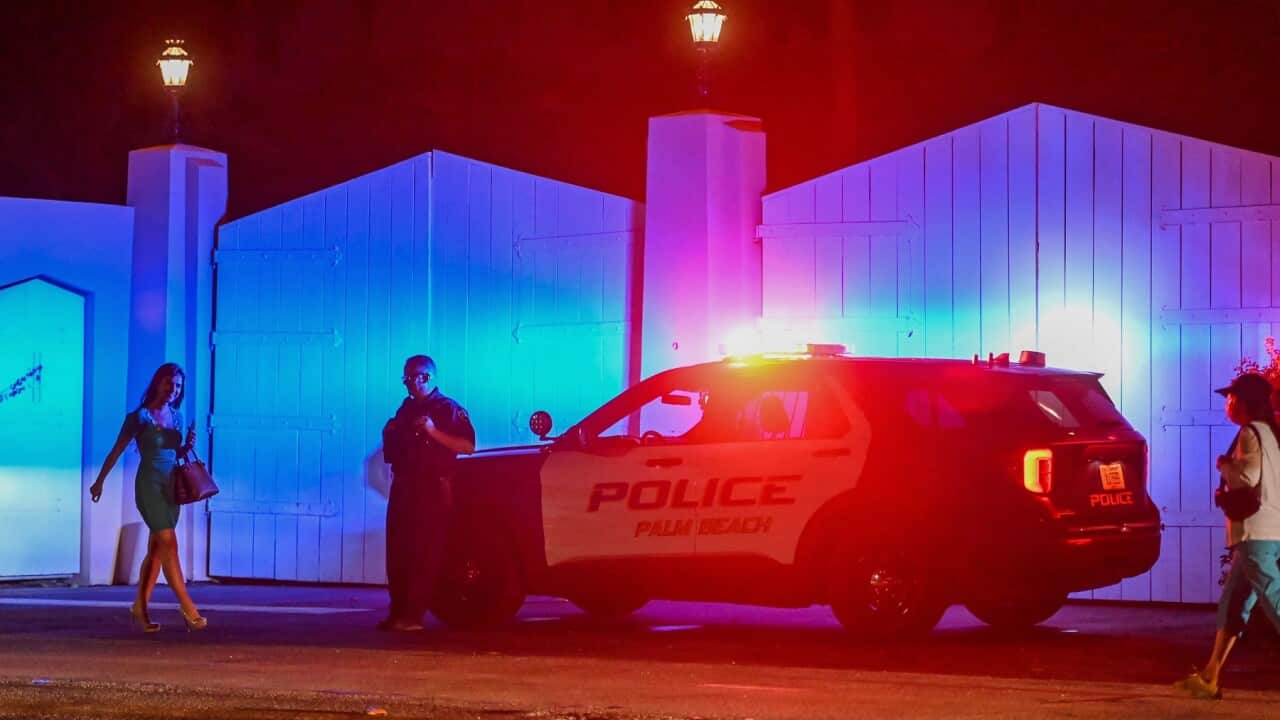 A police car outside former US President Donald Trump's residence in Mar-A-Lago, Palm Beach, Florida