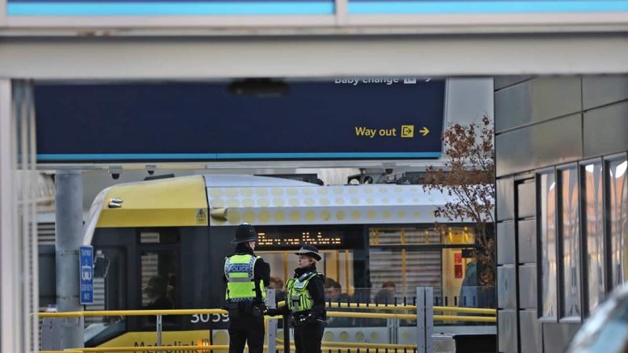 Police in Manchester Victoria station after the attack