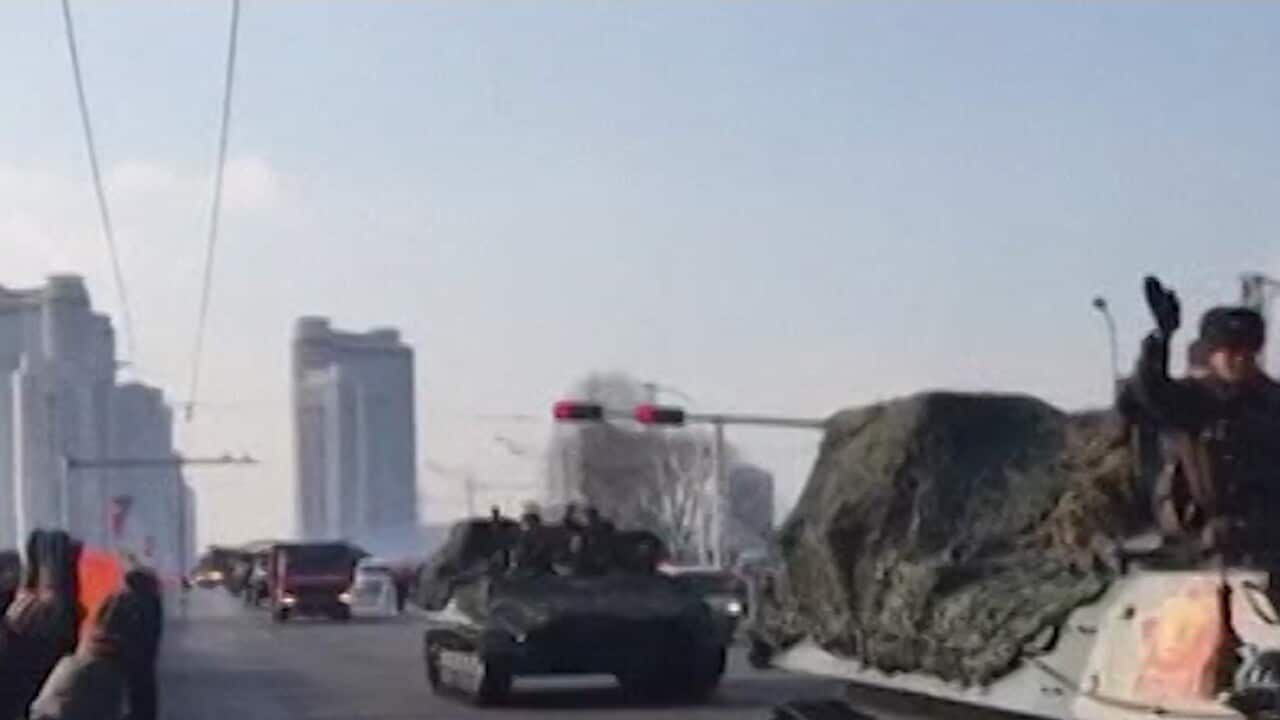 North Korea held a massive military parade on eve of the Winter Olympics.