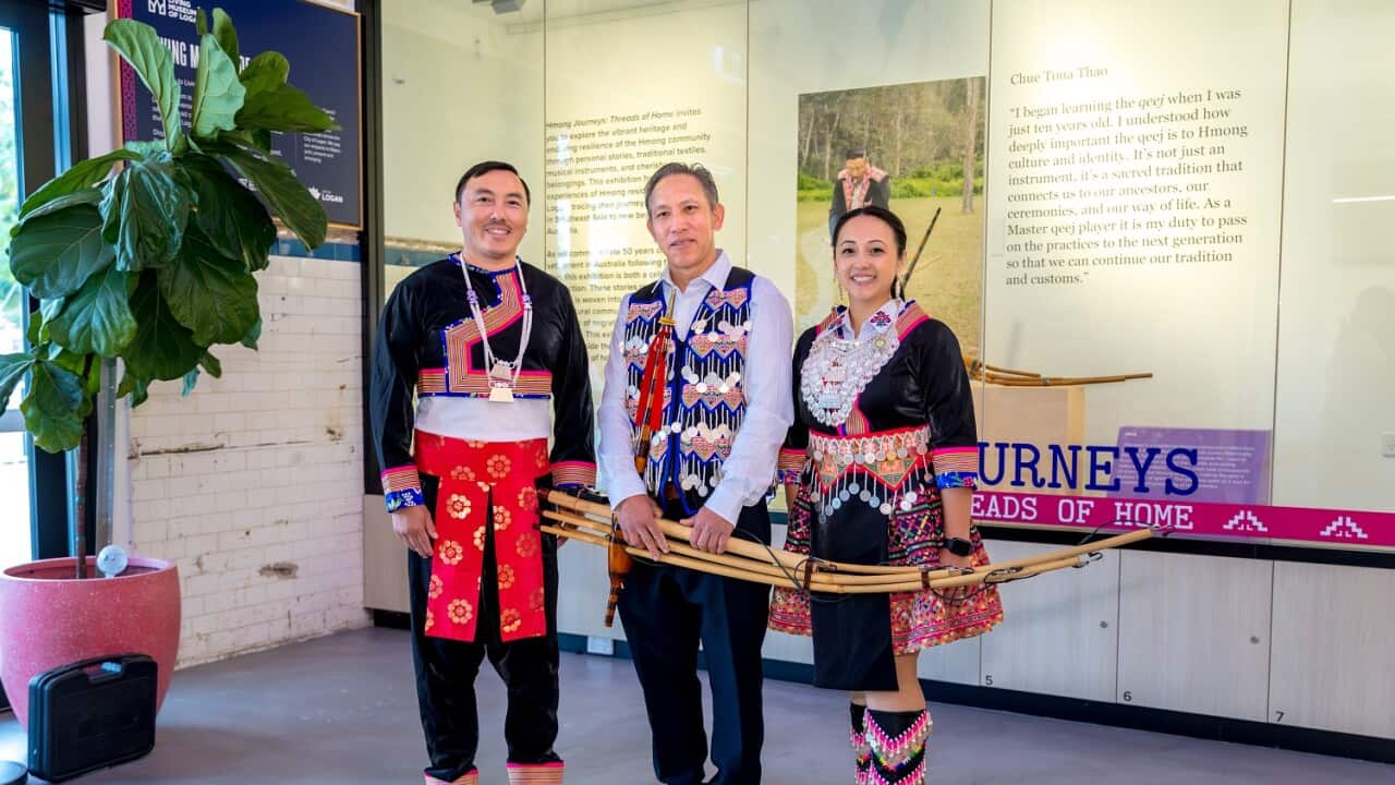 Bee Thao, Gia Xa Chang and Sarah Thao in Hmong traditional clothing at the opening of the new exhibition.jpg