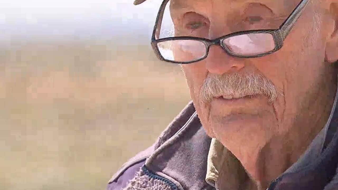A man wearing glasses