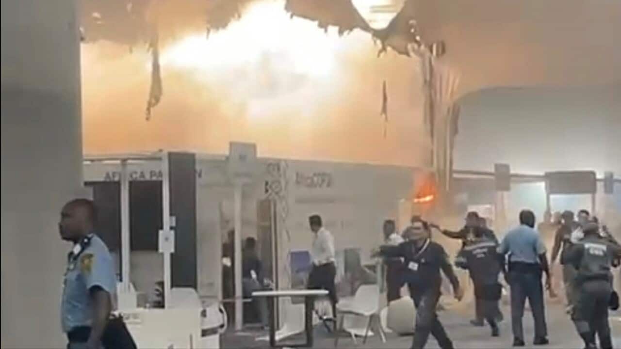 Fire forces evacuation of Brazil climate conference with negotiations still short of a deal Fire forces evacuation of Brazil climate conference with negotiations still short of a deal