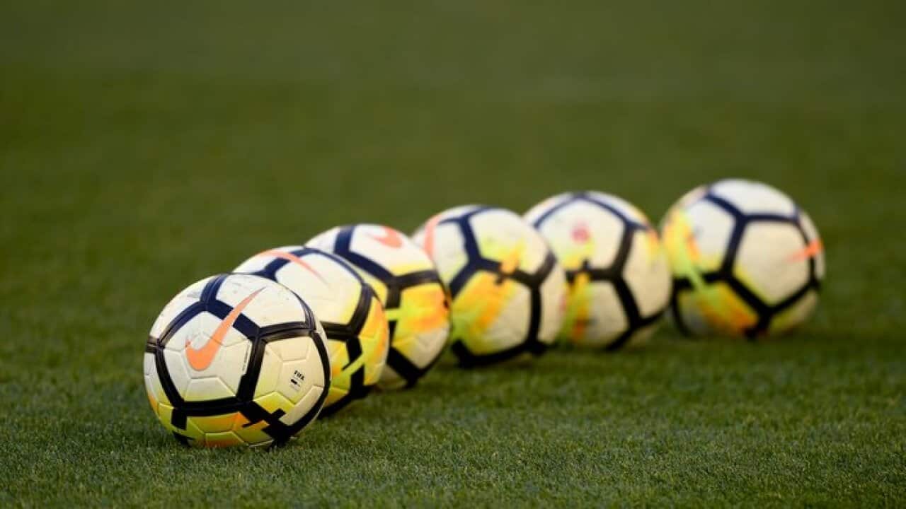 Practice balls on the ground.