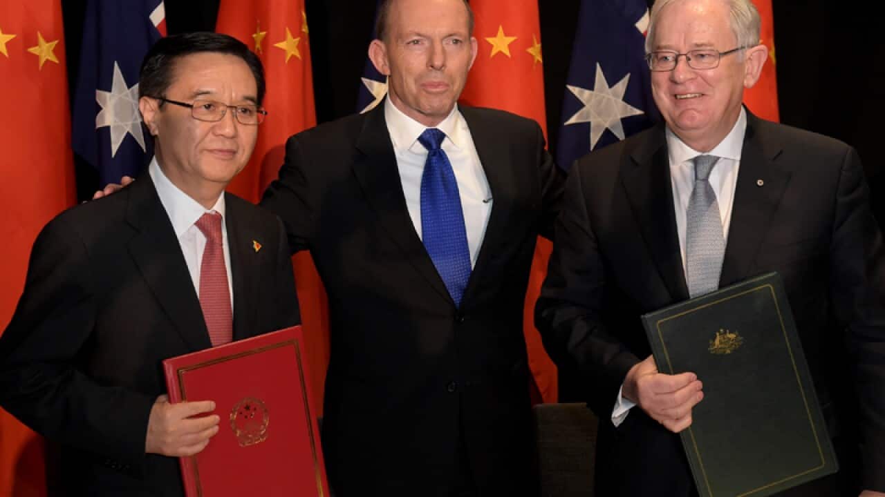 Chinese and Australian representatives after signing a free trade deal