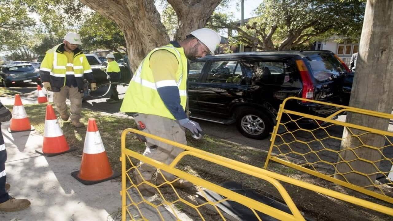 Labor could write down the value of the National Broadband Network .