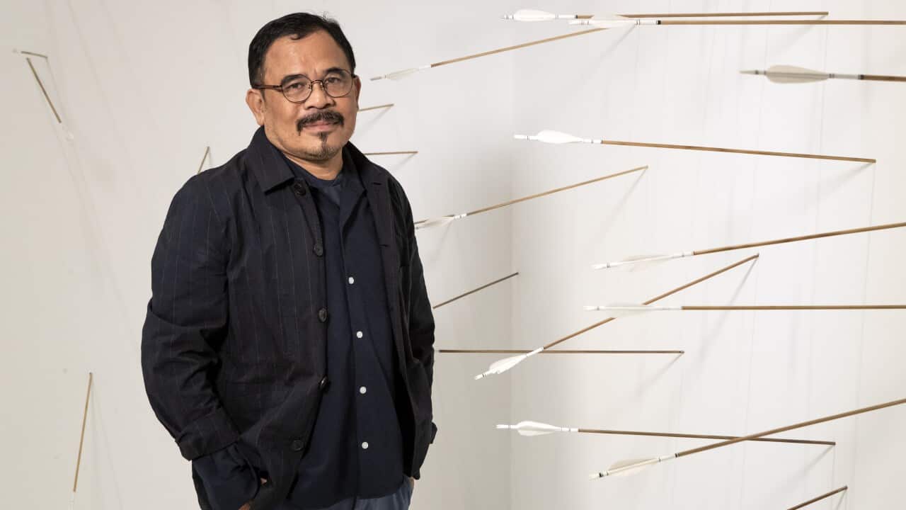 Garin Nugroho with Melati Suryodarmo’s Transaction of hollows (2016), part of the Contemporary Worlds: Indonesia exhibition.