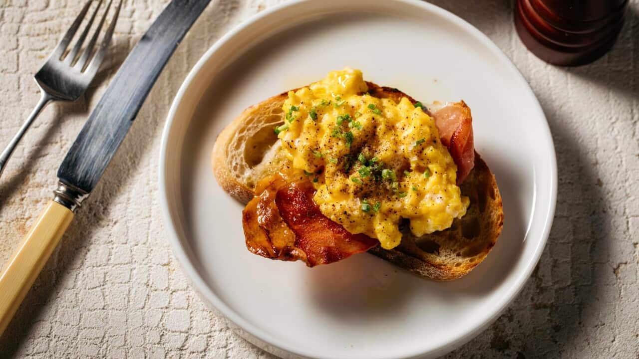 Truffle scrambled eggs with prosciutto on sourdough