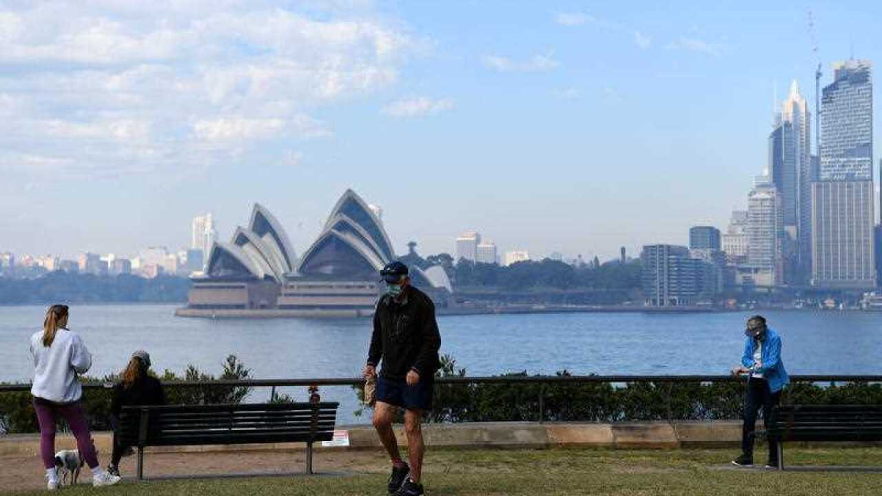 People exercise in Sydney, Sunday, August 22, 2021. credit: AAP Image/Bianca De Marchi