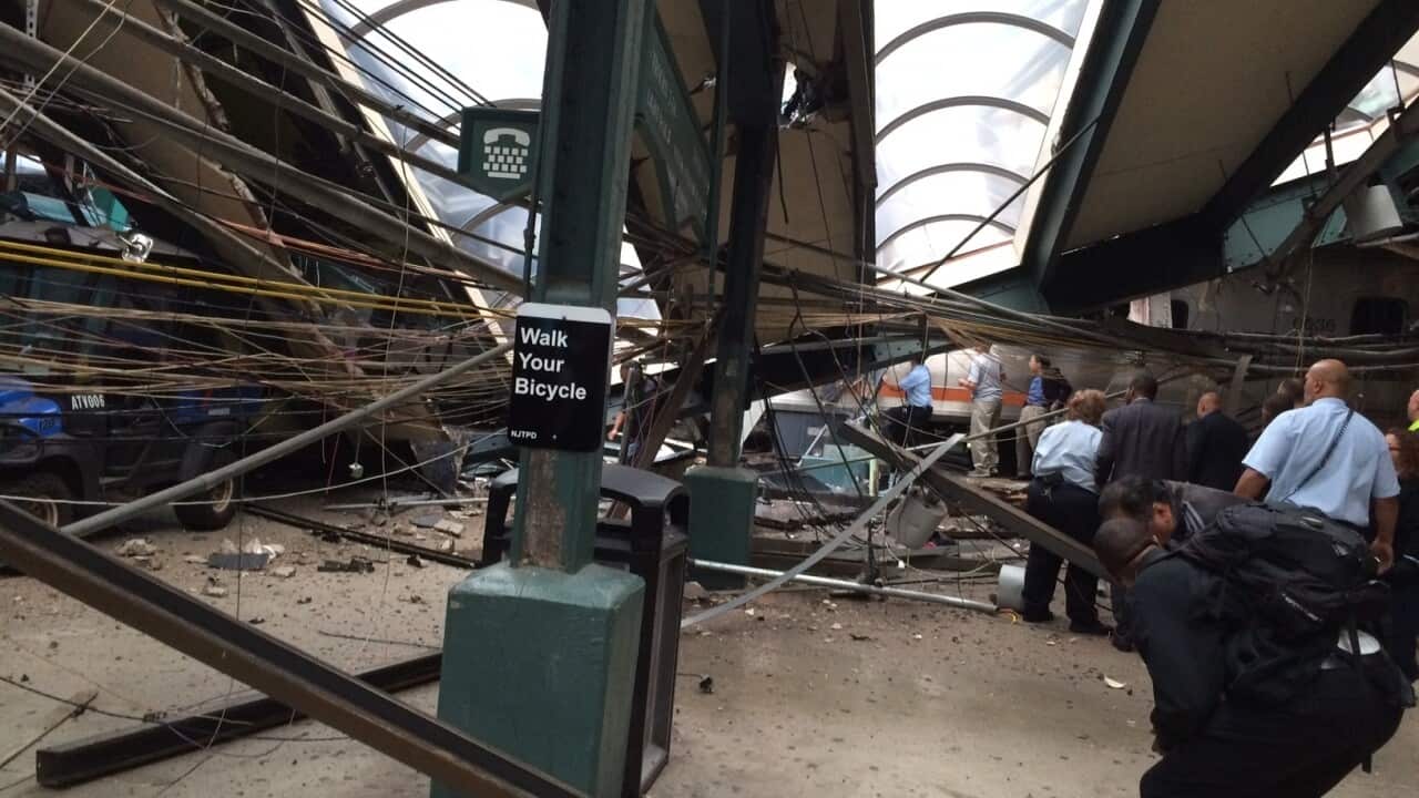 Structural damage is seen at the train station in Hoboken, N.J., after a New Jersey Transit commuter train crashed into the station during the morning rush hour