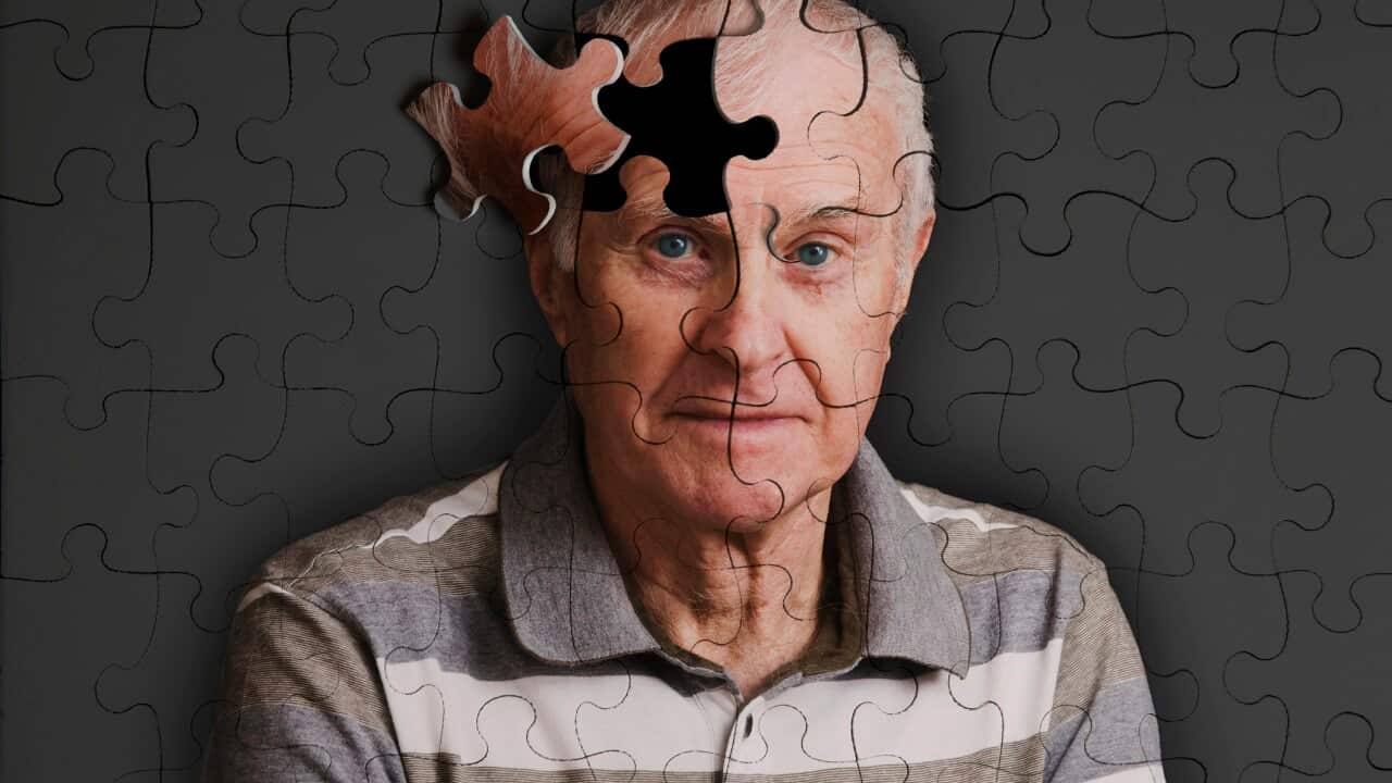 Jigsaw puzzle, of senior man, falling apart