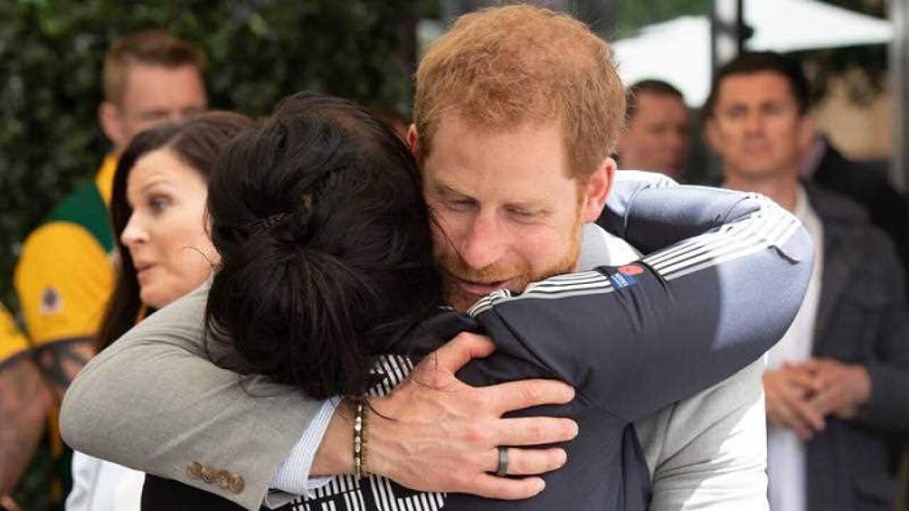 Prince Harry meets with a competitor at the Invictus Games
