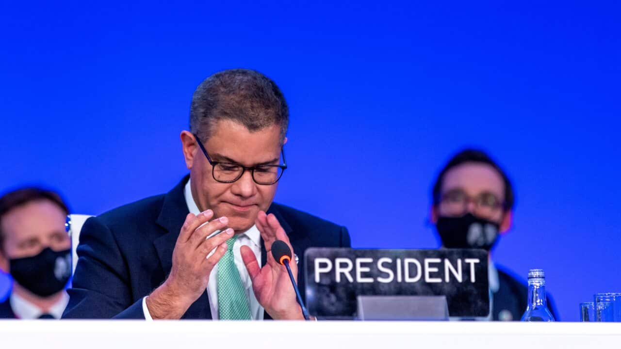 Alok Sharma (L), President of COP26 speaks during the final session of the COP26 UN Climate Change Conference in Glasgow,13 November 2021.