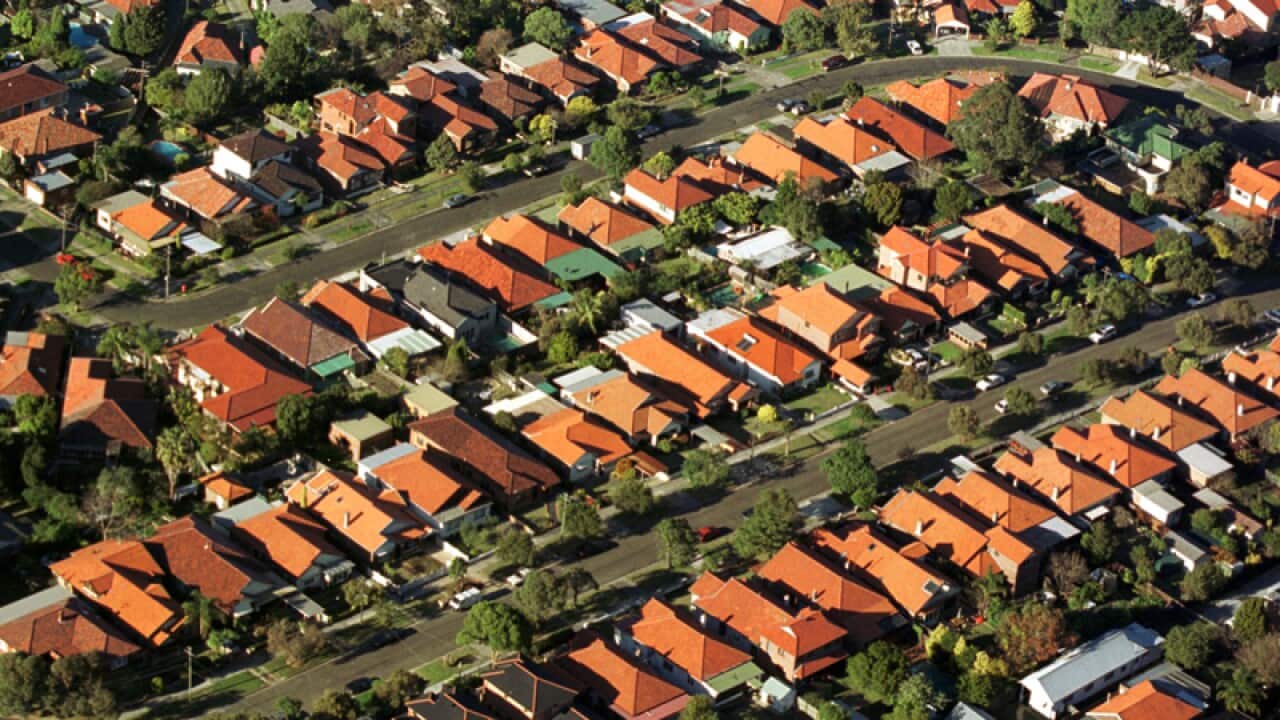Sydney Aerial shot looking over house roof tops