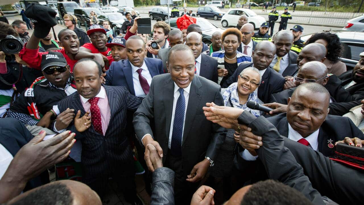 Kenya's President Uhuru Kenyatta (C) arrives at the International Criminal Court. (AFP)
