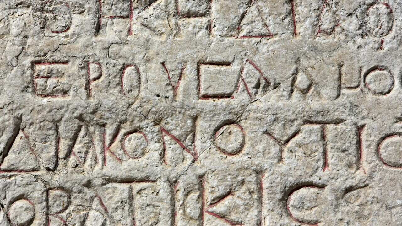 The Greek alphabet inscribed into stone.