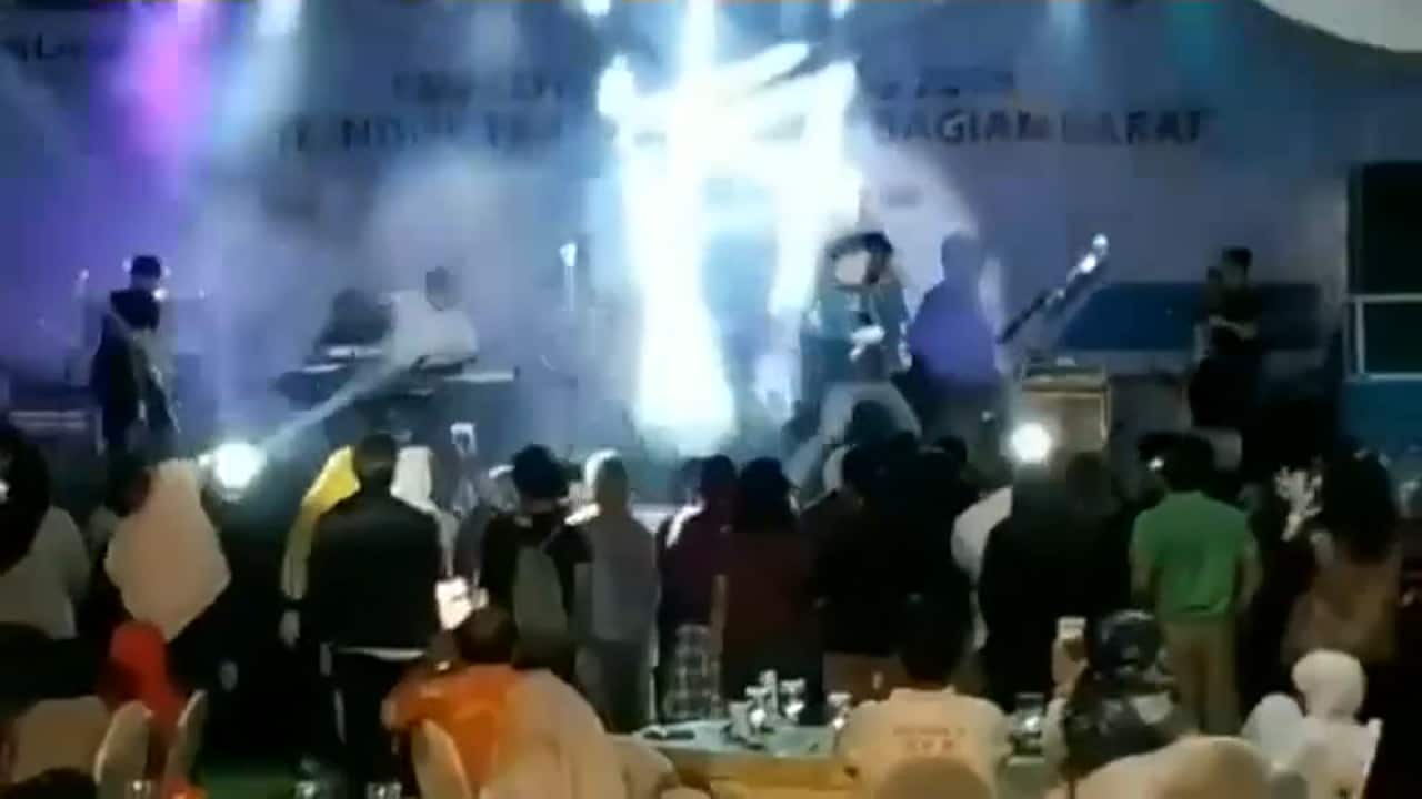 A video shared online captures the moment the tsunami hit the stage where the band Seventeen were performing.