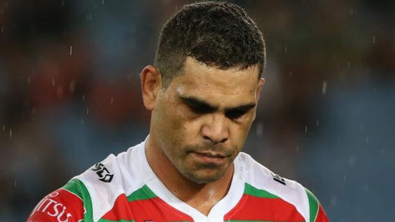 Greg Ingles in reflection during game wearing South Sydney jumper