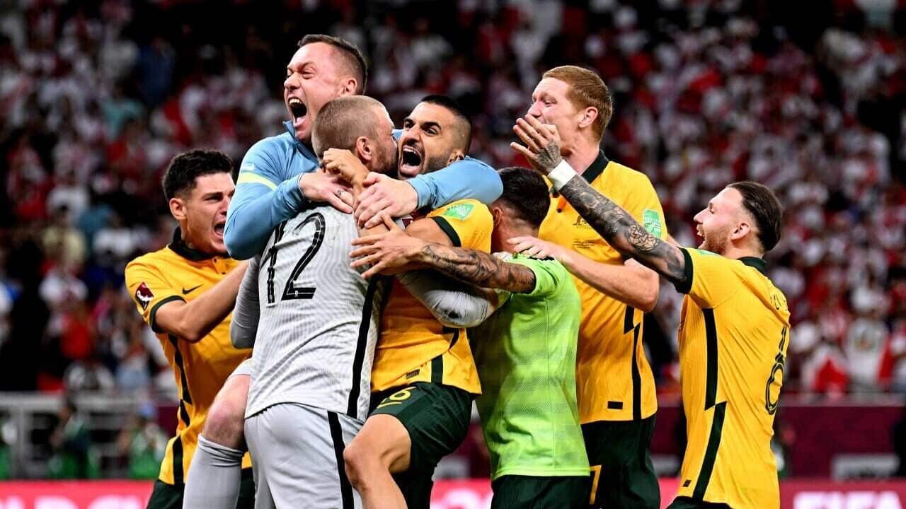Australia celebrate after defeating Peru in the 2022 FIFA World Cup Playoff match between Australia Socceroos and Peru at Ahmad Bin Ali Stadium on 13 June, 2022 in Doha, Qatar.