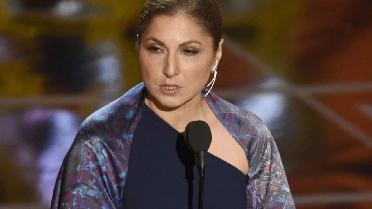 Anousheh Ansari accepts the award