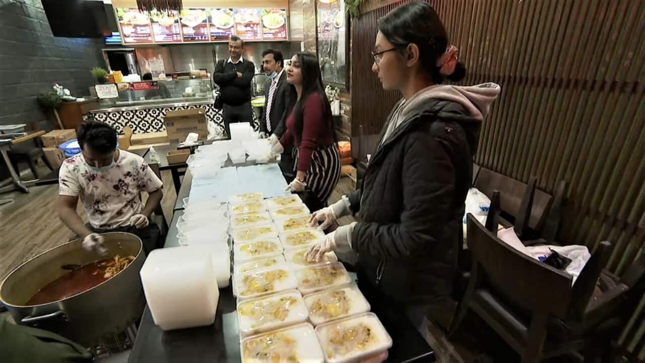 Volunteers preparing to serve meals