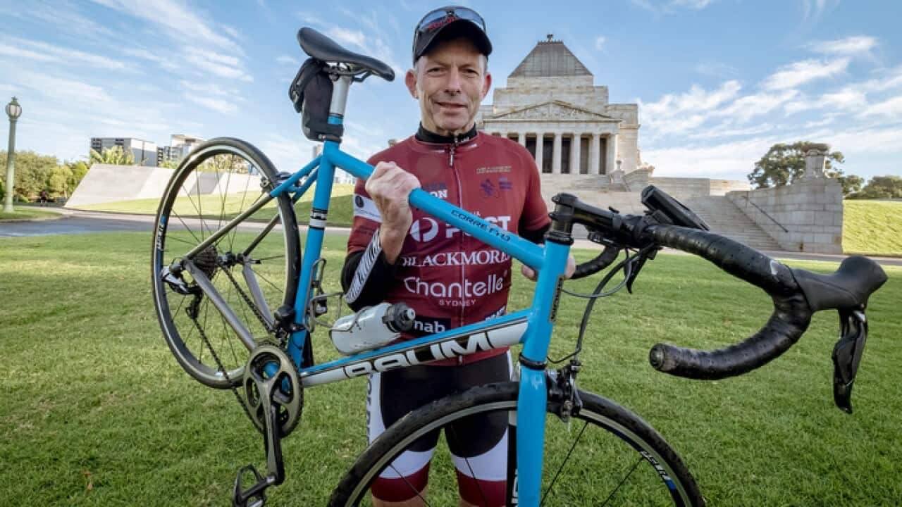 Former prime minister Tony Abbott takes part in the Pollie Pedal Bike Ride