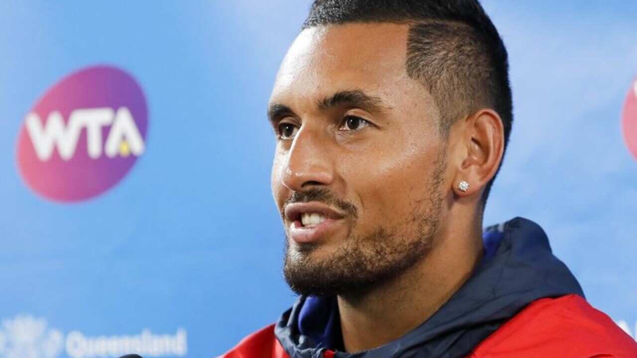 Nick Kyrgios speaks to media