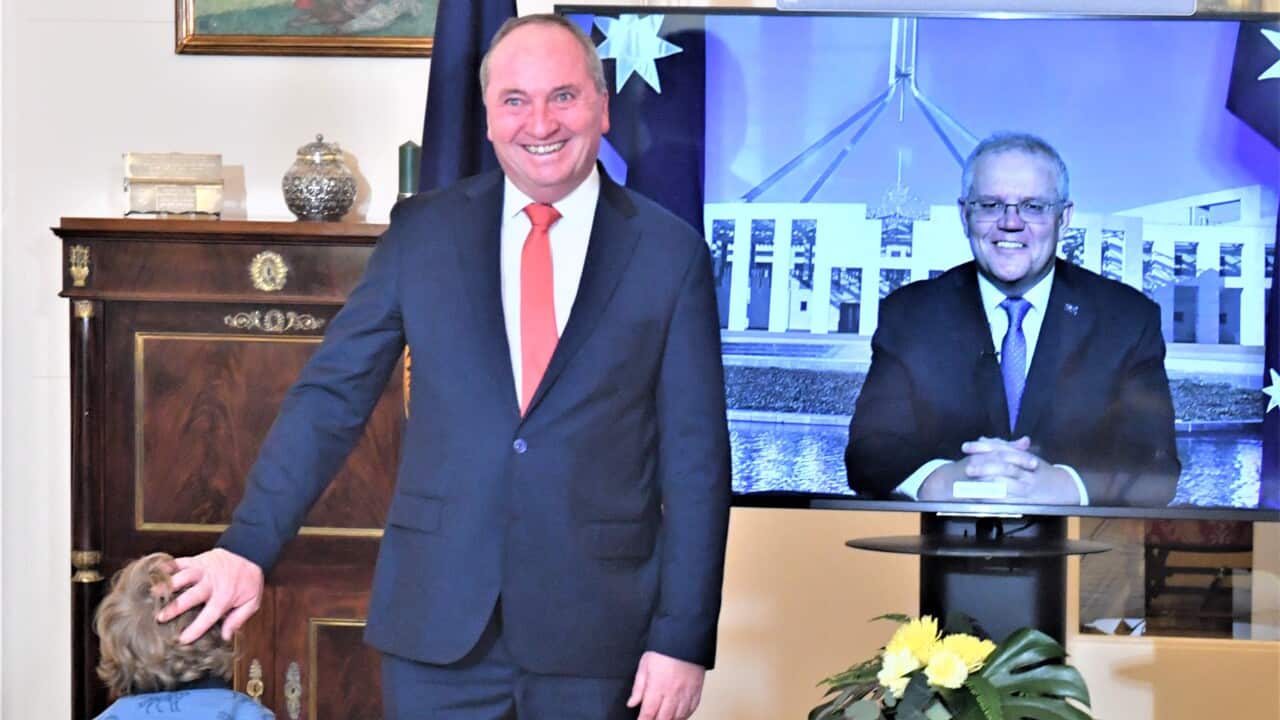 Nationals leader and Deputy Prime Minister Barnaby Joyce, and Prime Minister Scott Morrison in quarantine after a swearing-in ceremony at Government House in Canberra, Tuesday, June 22, 2021. (AAP Image/Mick Tsikas) NO ARCHIVING