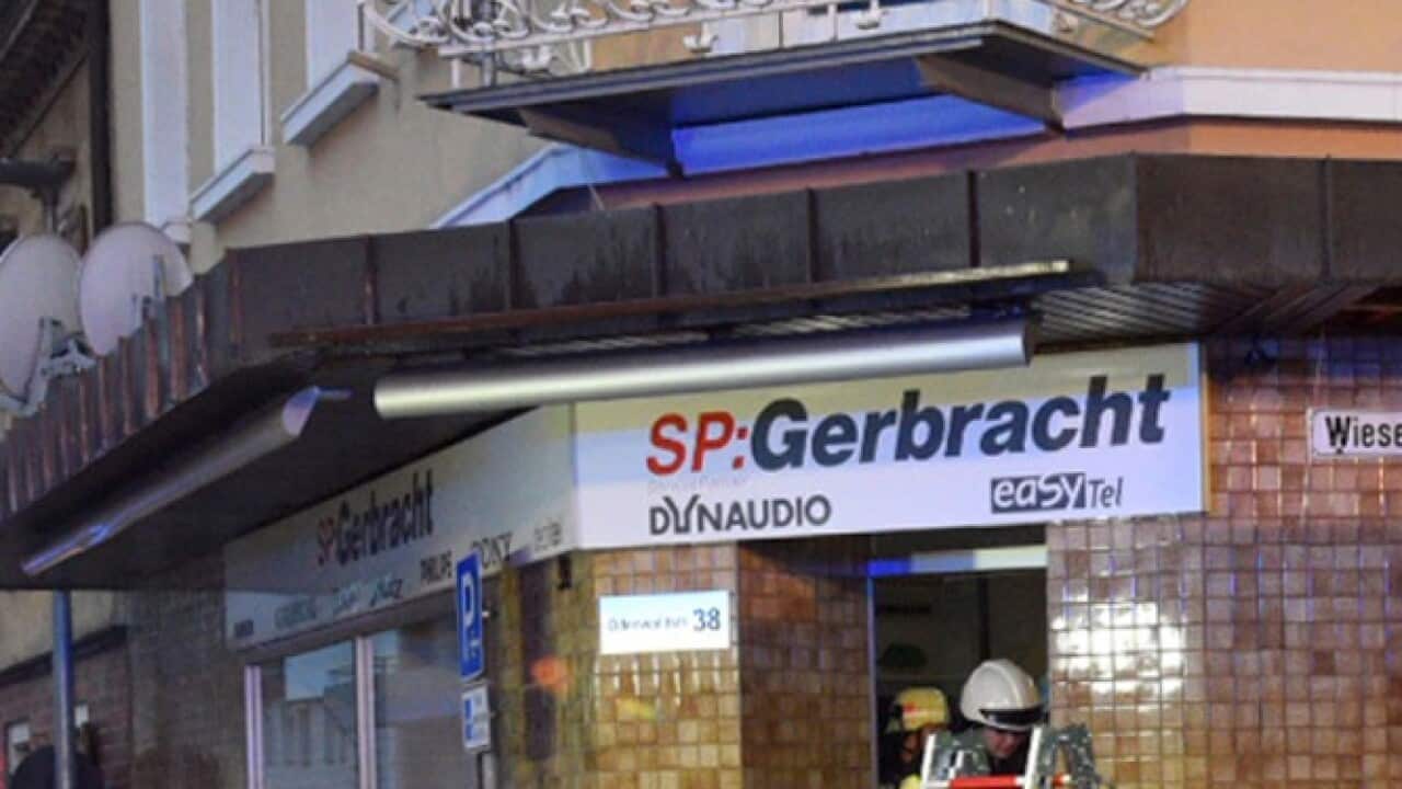 A bus sits in the facade of a building in Eberbach near Mannheim, southern Germany,