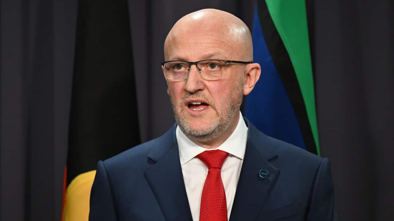 Director-General of the Australian Security Intelligence Organisation Mike Burgess talks to journalists during a press conference.