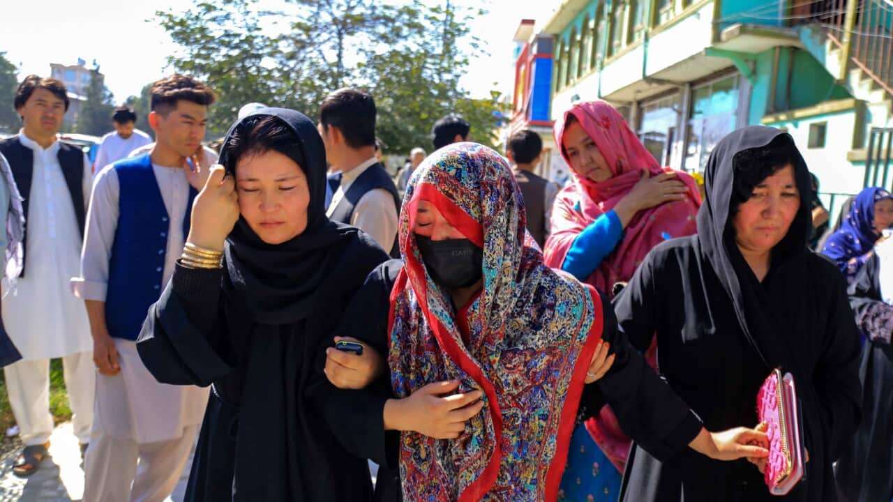Relatives of a teenage girl killed in a suicide bomb attack (AAP)