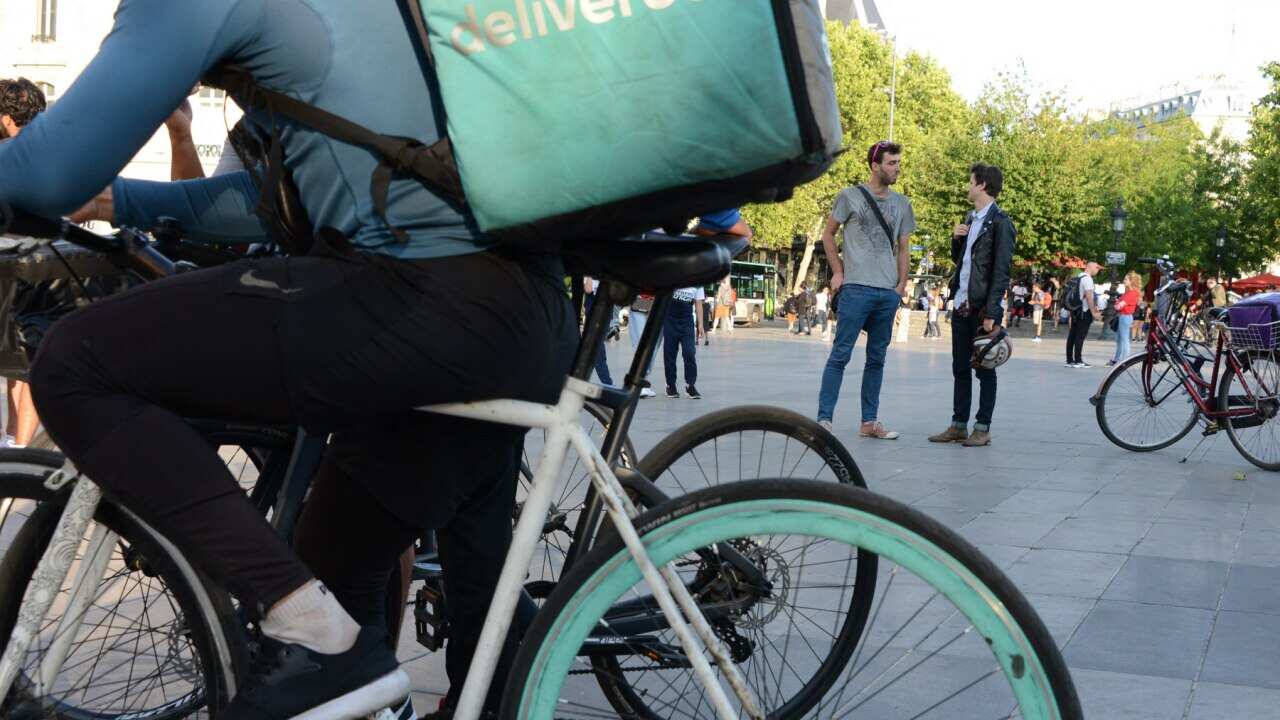 Deliveroos food courier service driver