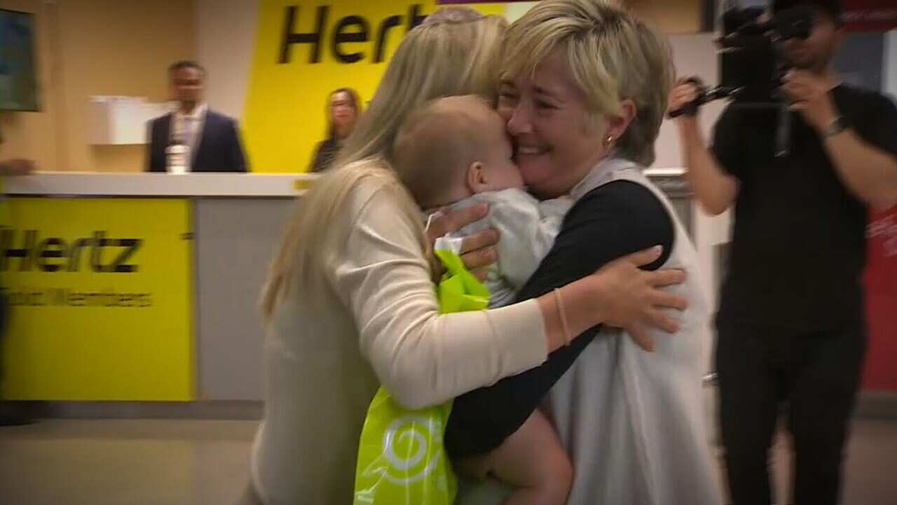 Tearful welcomes as families reunite at Auckland Airport