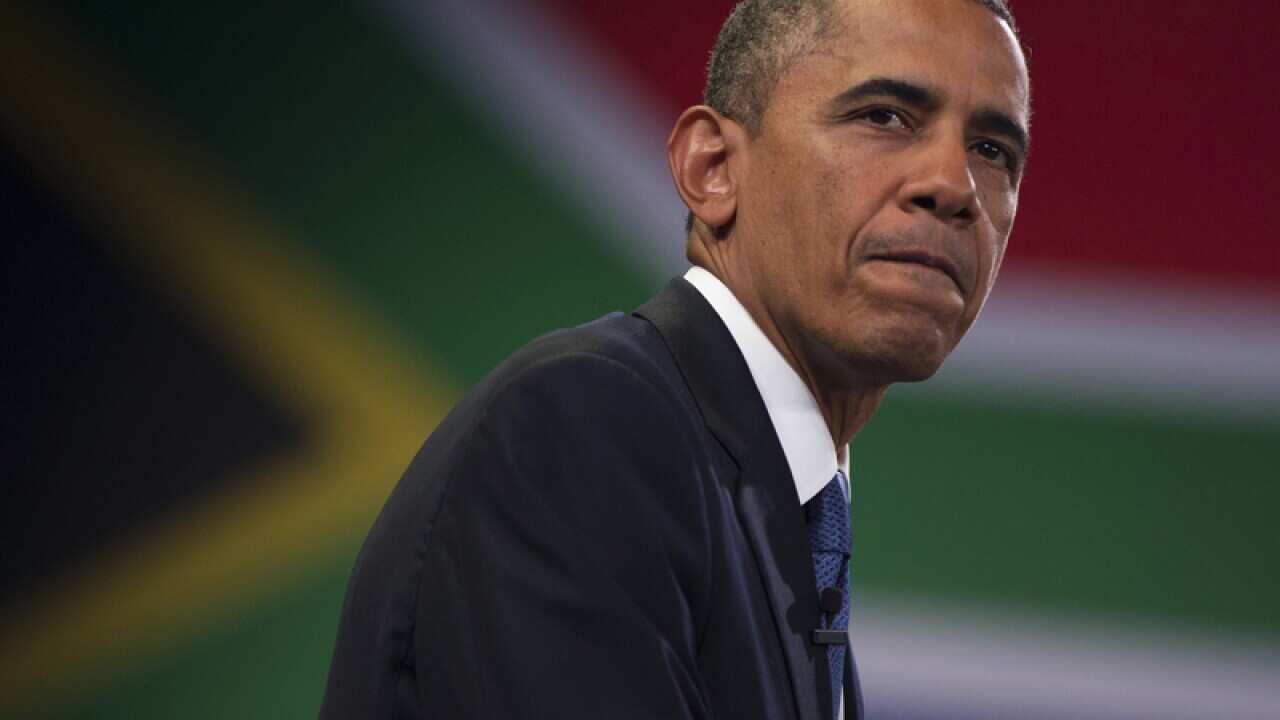 Obama meets family of ailing hero Mandela
