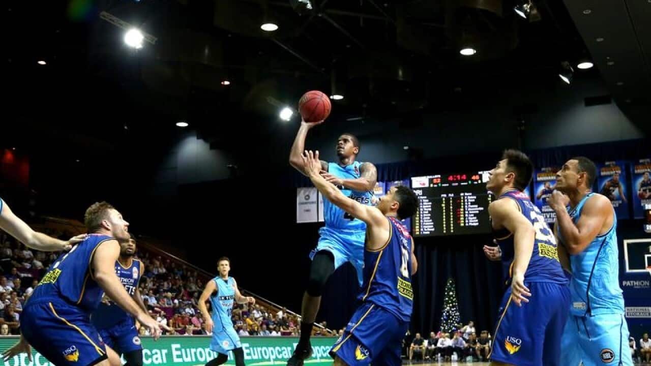 Edgar Sosa of the Breakers in jumps for the hoop against Brisbane.