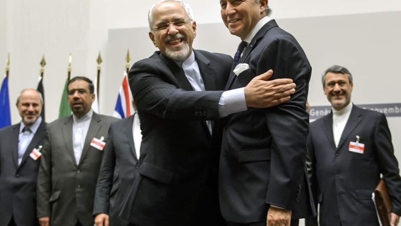 Iran Mohammad Javad Zarif (L) and France's Laurent Fabius