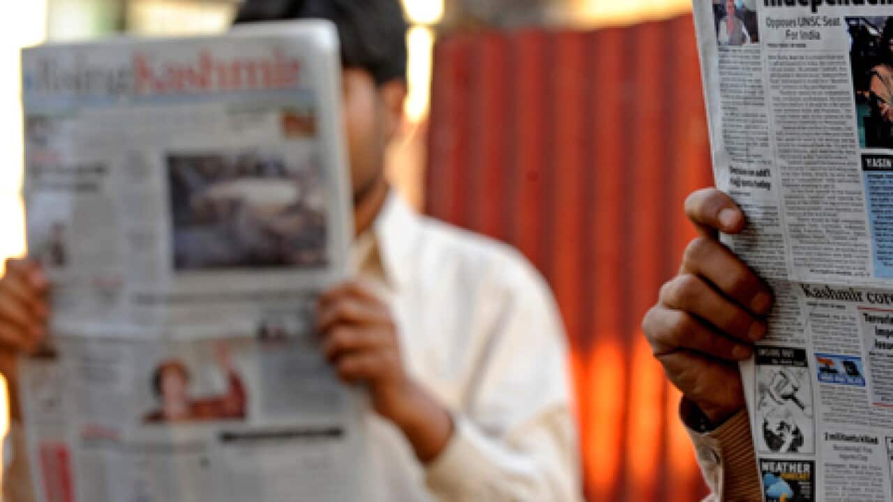 india_newspapers_reading_100219_B_getty_1863399272