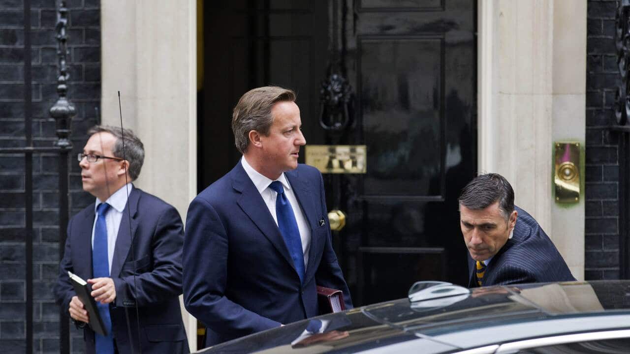 British Prime Minister David Cameron leaves 10 Downing Street