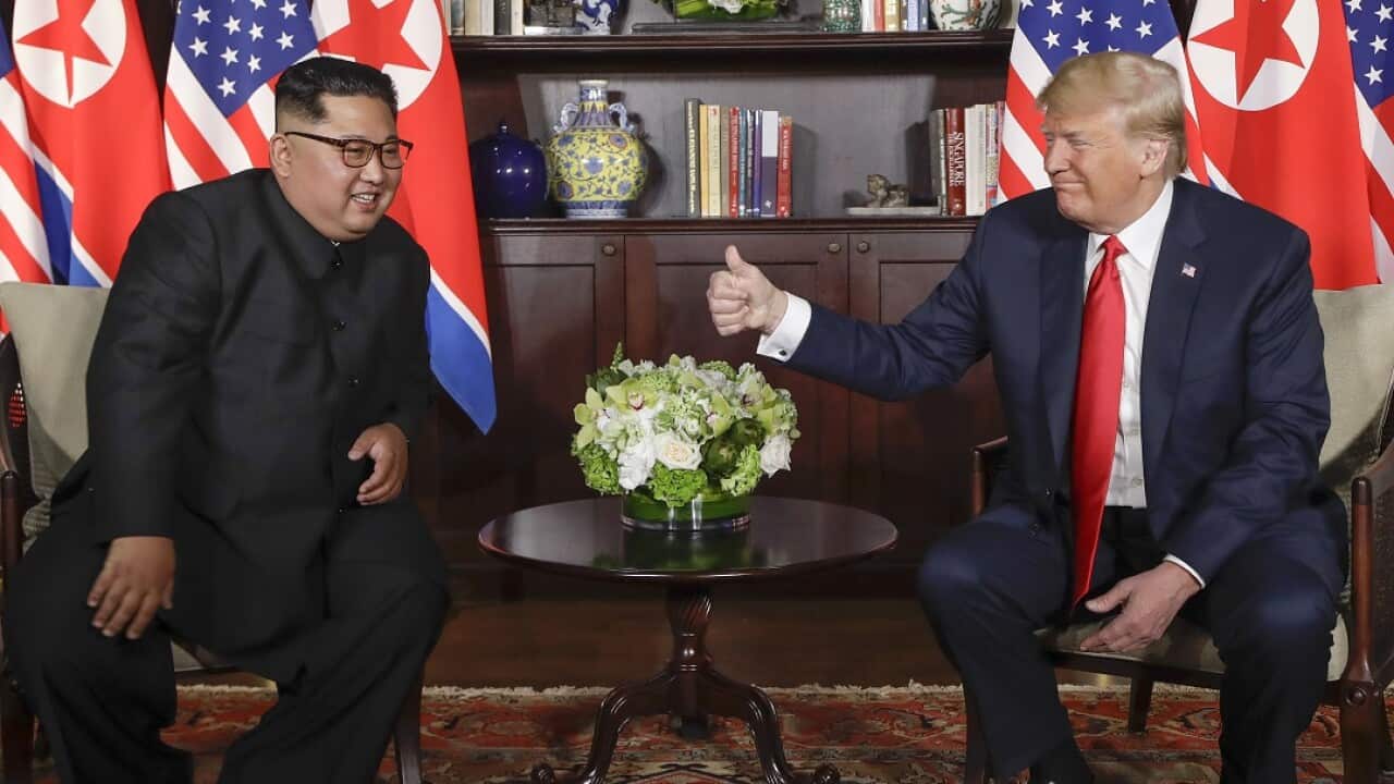 Donald Trump gives the North Korea leader Kim Jong-un a thumbs up at their historic meeting on Sentosa Island.
